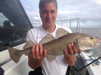 4 lb 7 oz Cod by Dave Lucas