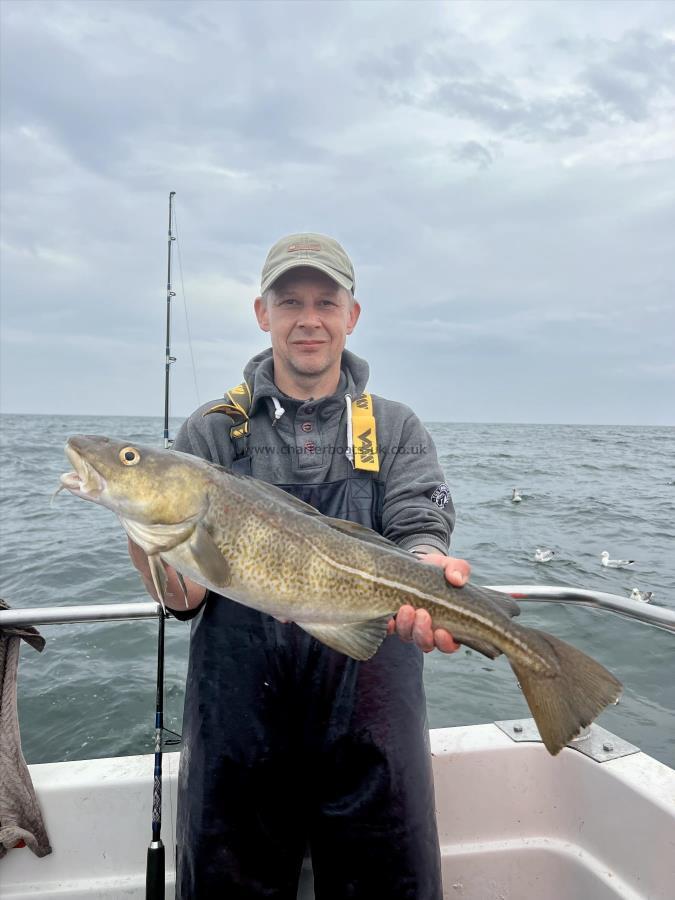 7 lb 4 oz Cod by Grzegorz Dubiel