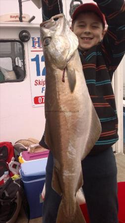 9 lb Pollock by sam holding his grandads fish