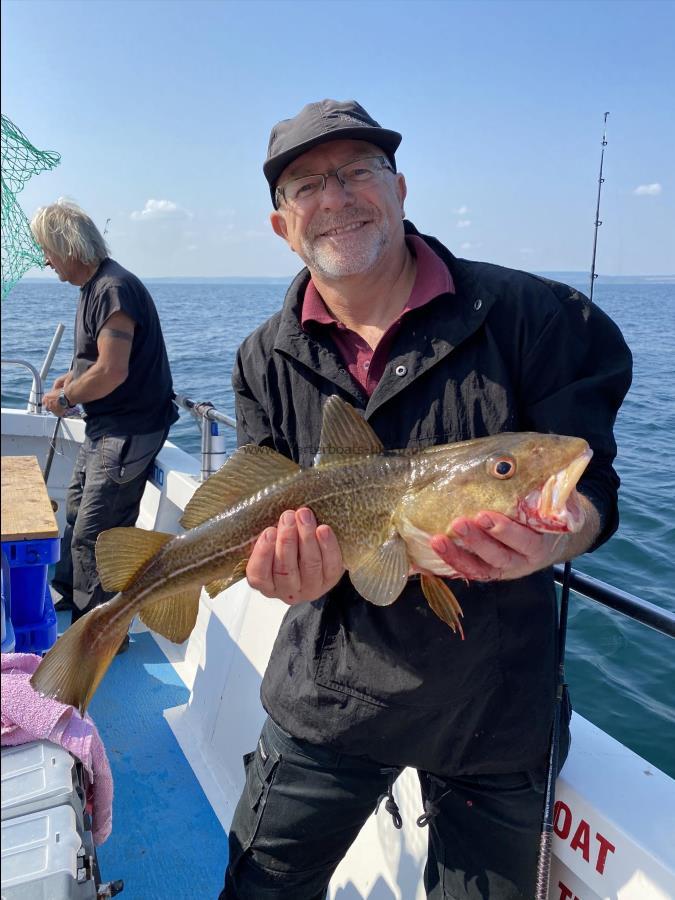 4 lb 4 oz Cod by Martin.