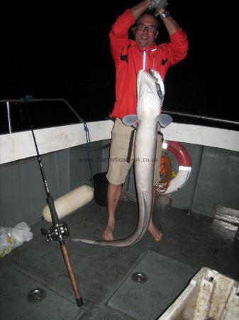 50 lb Conger Eel by Tom Byers, he really ought to wear shoes!