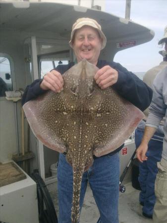 12 lb Thornback Ray by brian simmons, give the kid his hat back