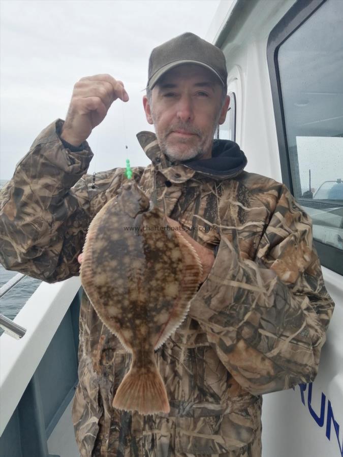 1 lb 4 oz Flounder by Paul