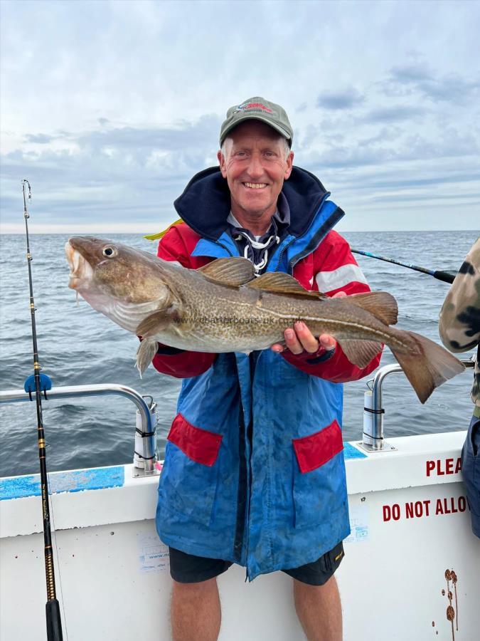 6 lb 14 oz Cod by Martin.