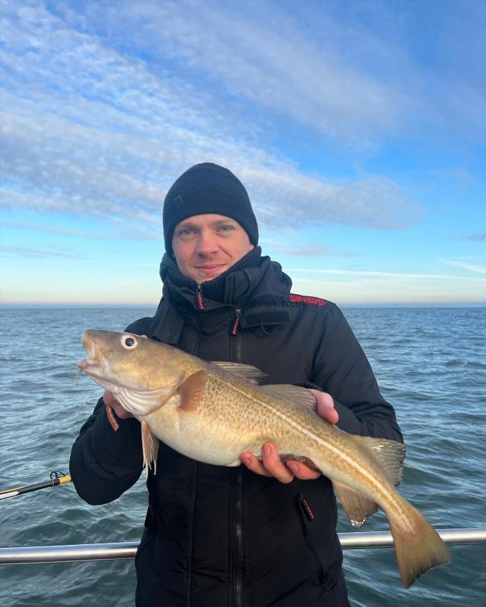 4 lb 12 oz Cod by Rafal Kosatka Group