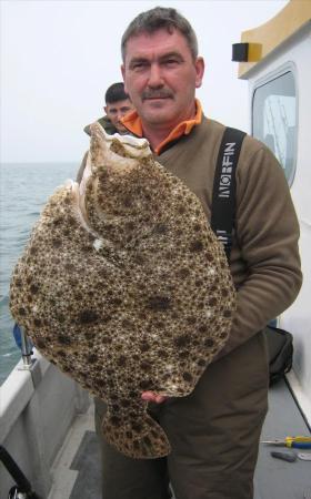 11 lb 12 oz Turbot by Guntis Strautmanis