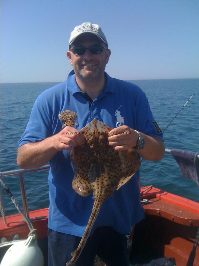 3 lb Spotted Ray by Alex Kweller on 'Just Mary' off Dancing Ledge.....