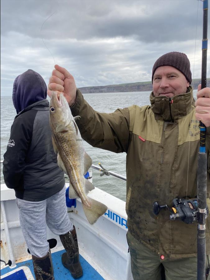 2 lb 10 oz Cod by Marek Kowka.