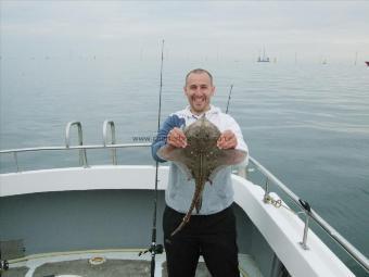 5 lb Thornback Ray by man