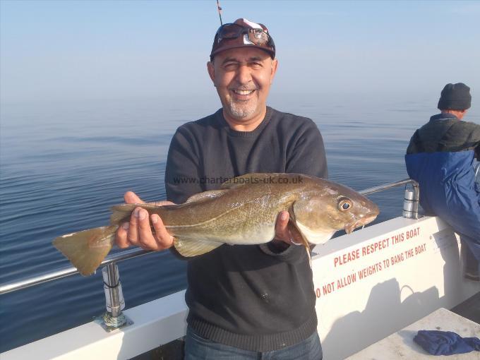 5 lb 3 oz Cod by Ismail Nabeel.