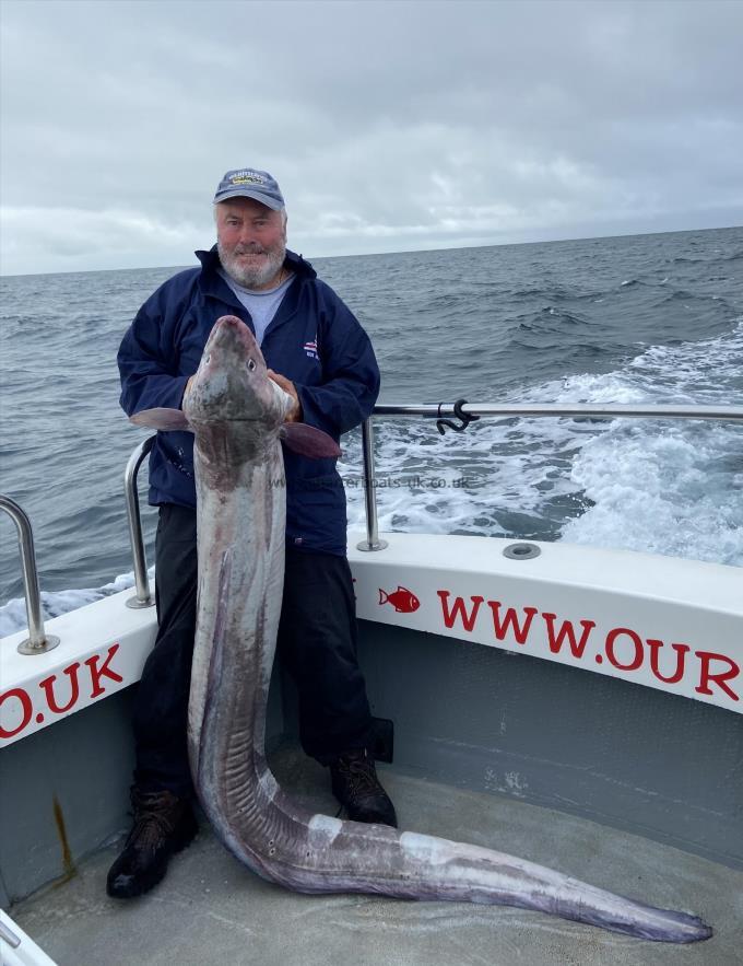 84 lb Conger Eel by Paul Maris