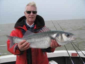 12 lb 1 oz Bass by Roger Chase with his bass caught from Sophie lea