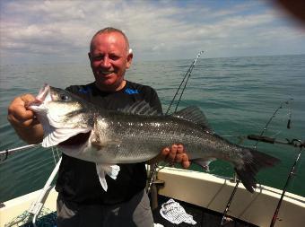 11 lb 7 oz Bass by catch and released fought well and swam of strong