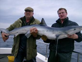 84 lb Blue Shark by skipper