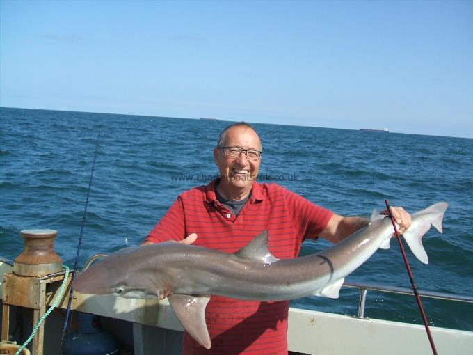 49 lb 8 oz Tope by John with number 2