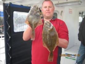 2 lb 5 oz Flounder by Phil with a pair of Flounder