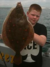 5 lb 4 oz Plaice by Young Boy